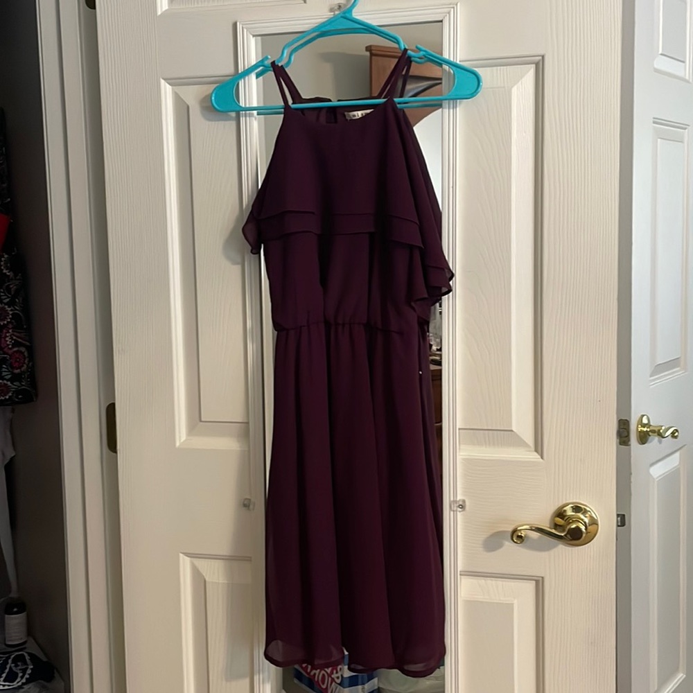 Francesca’s purple flounce ruffle dress